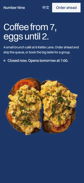 The opening screen on a phone: Coffee from 7, eggs until 2, whether it's open now, and a large plate of eggs on toast