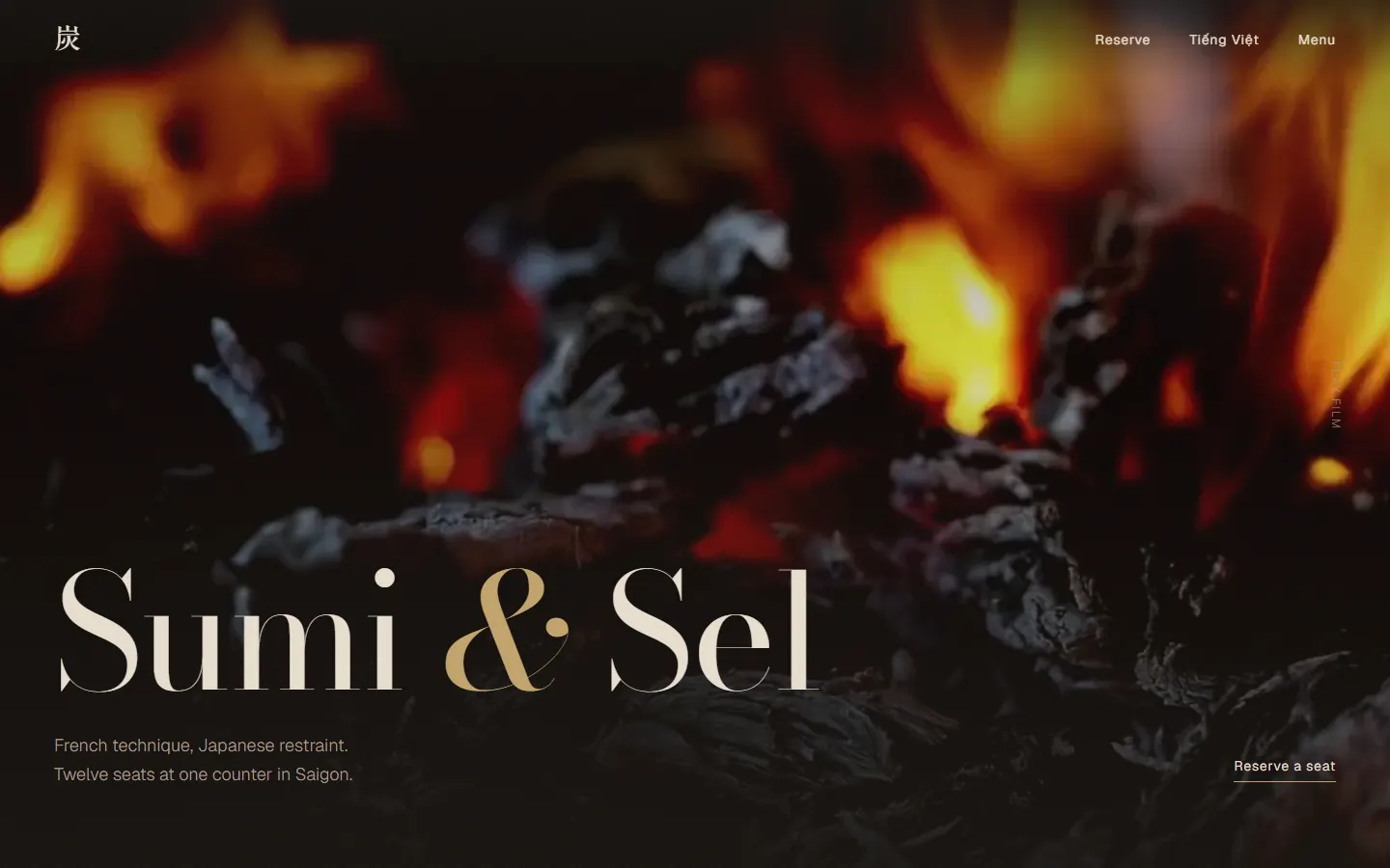 Sumi & Sel home page: the name in large serif letters over a close-up of glowing charcoal